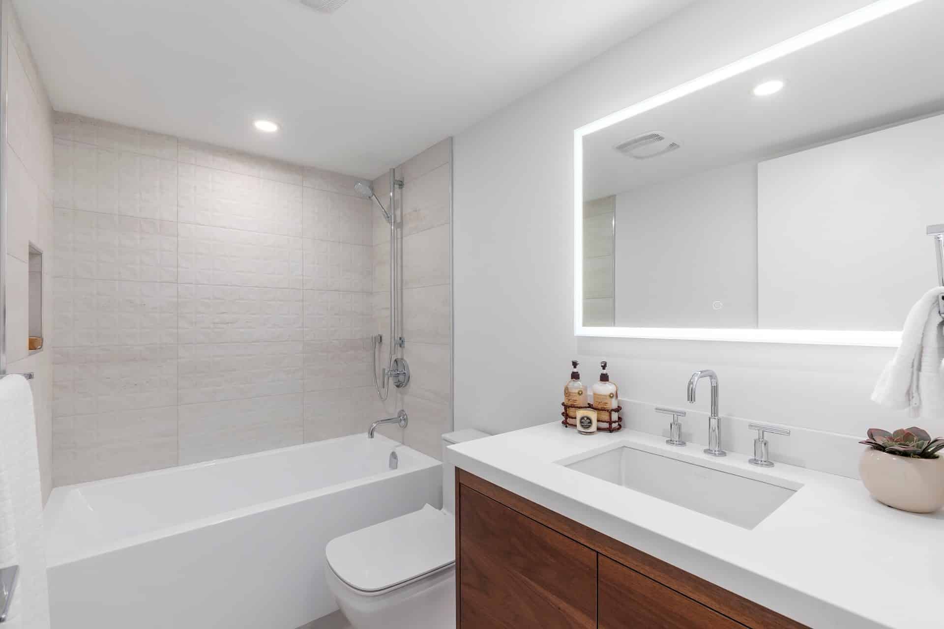 bathroom-remodel-lighted-mirror-3d-wall-tile-tub-niche