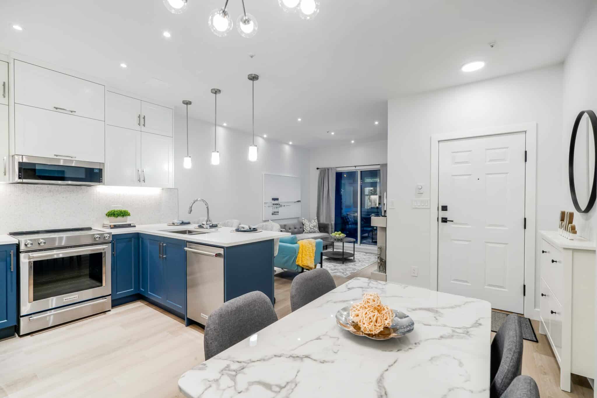 kitchen-dining-room-living-navy-white-modern-stainless-steel-light-wood-flooring-renovation